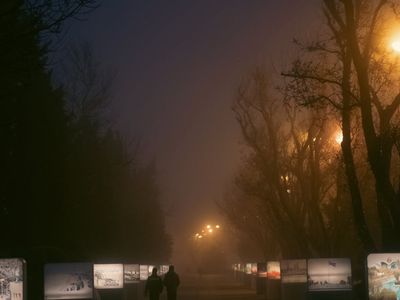 Stylized city silhouette with walking paths